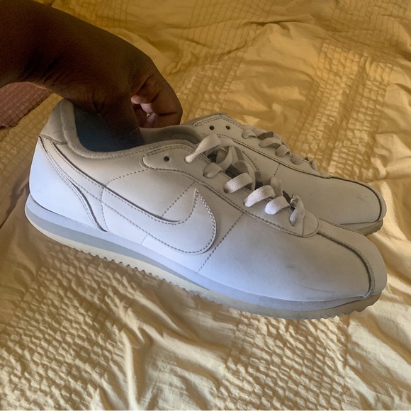 all white nike cortez on feet